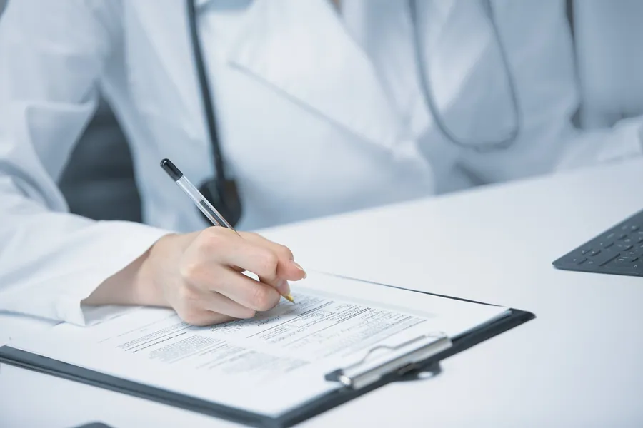 Cosmetics laboratory reviewing contract manufacturing documentation